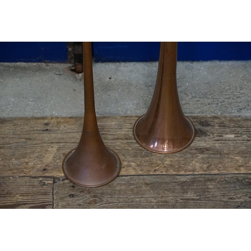 729 - Two Brass & Copper Hunting Horns. Measuring: 125cms & 100cms.