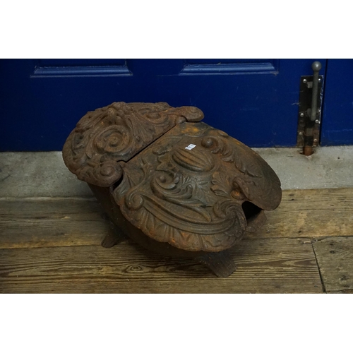 732 - A Late 19th Century French Cast Iron Lift Top Coal Scuttle in over the top floral design.