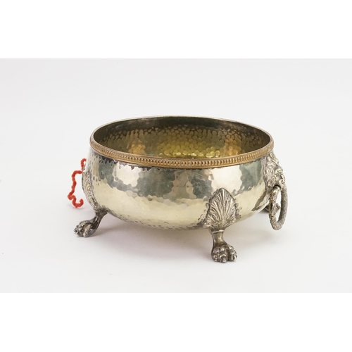 78 - A silver plate lion head and claw decorated bowl.