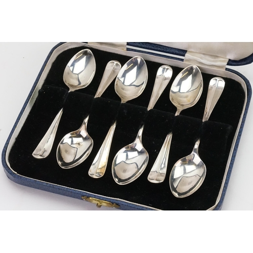 29 - A set of six silver Sheffield cased teaspoons.
