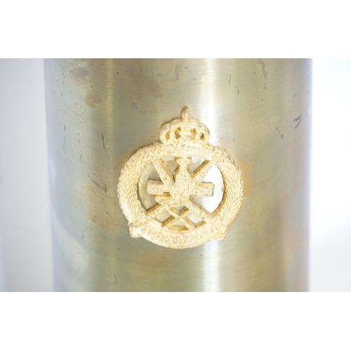 328 - A Modern Trench Art Brass Shell Case decorated with Omani insignia of crossed Swords & Dagger, dated... 