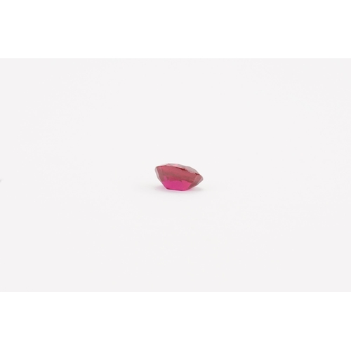 91 - A deep single stone cushion cut ruby. Weight 1g. 10.9mm x 10mm. 5.5mm deep.