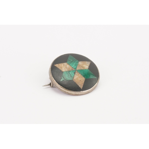 117 - A Scottish pebble brooch, set with malachite.