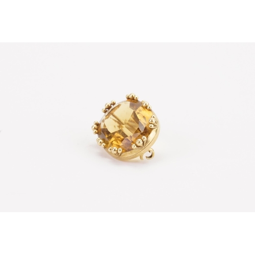 150 - A 15ct gold citrine set brooch. 24mm x 19mm. Weight 9.3g.