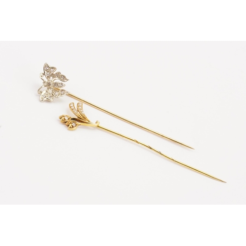 163 - A diamond butterfly stick pin, along with a seed pearl and diamond stick pin.