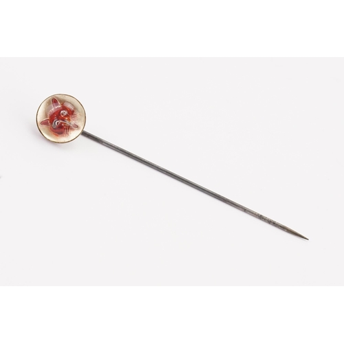 174 - A silver fox domed stick pin.