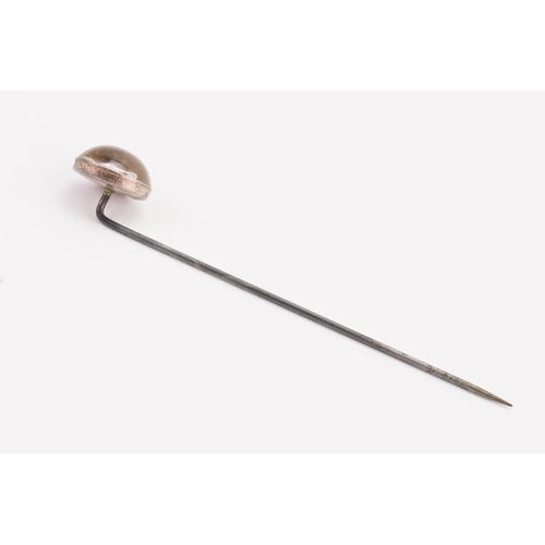 174 - A silver fox domed stick pin.