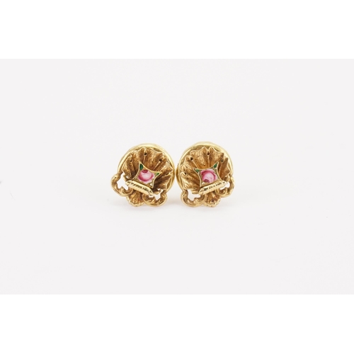 189 - A pair of gold coloured earrings, set with enamelled flowers. Weight 3g.