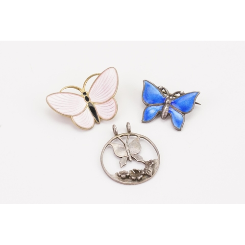 190 - A set of two enamelled silver butterfly brooches, and one pendant. Weight 9.4g.