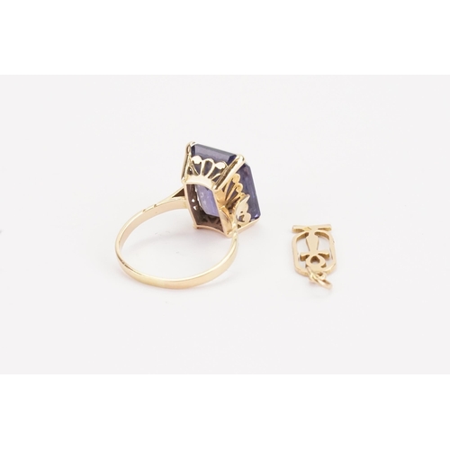 194 - A higher than 9ct gold Egyptian marked possibly amethyst set ring, gem approximately 17mm x 12.8mm. ... 