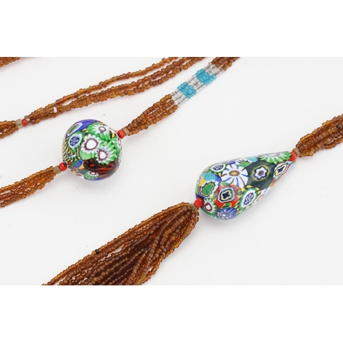 211 - A Murano Sautier with various shaped coloured beads with Brown & Blue hangers.