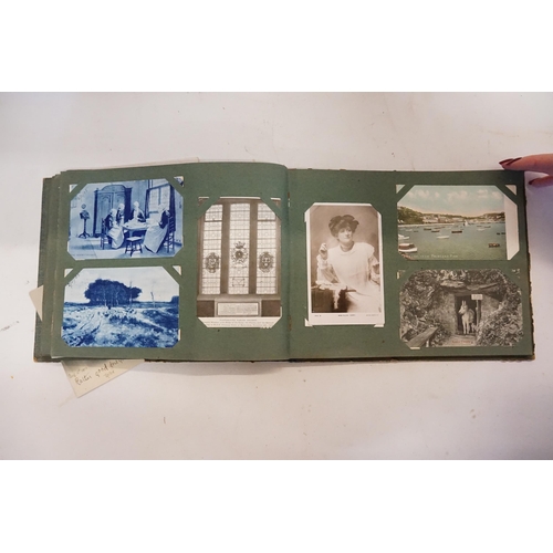 493 - A Vintage Post Card Album containing Nelson's Flagship, The Foudroyant wrecked at Blackpool 1897, Vi... 