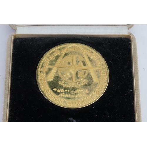 317 - Gold plated, steel medal made by the Kuwait bank in the 1980s