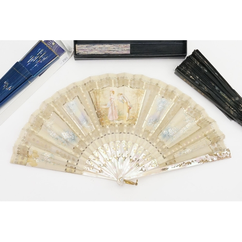 916 - A mother of pearl decorated fan with sequin decoration, along with three others.