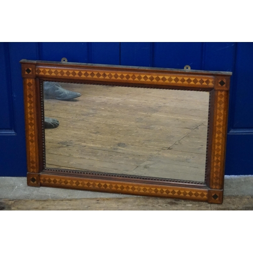 652 - An Irish design Ebony & Sycamore Hall Mirror decorated with Bow Tie inlay. Measuring: 90cms x 55cms.