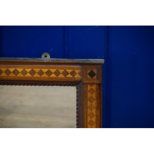 652 - An Irish design Ebony & Sycamore Hall Mirror decorated with Bow Tie inlay. Measuring: 90cms x 55cms.