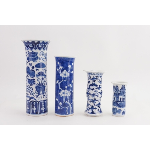 856 - A Chinese GU Shaped Blue & White Vase decorated with birds & mark to base along with three trumpet s... 