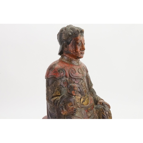 854 - Ex Collection Theophilus Peters - A Chinese hardwood painted Statue depicting a Seating Ancestor wit... 