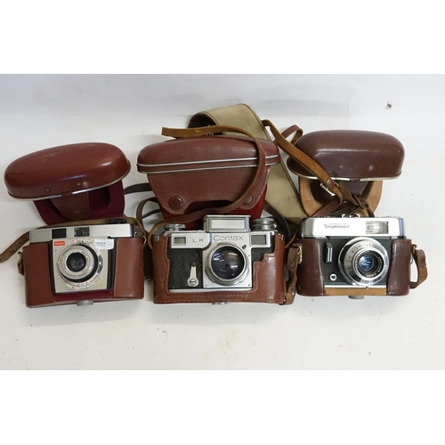 439 - Three various Cameras to include a Kodak 35, a Voighander & a Contex LH Camera with Flash Holder, al... 