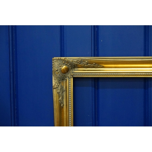 795 - A modern Gilt Framed Picture Frame to fit a picture size: 92cms x 123cms.