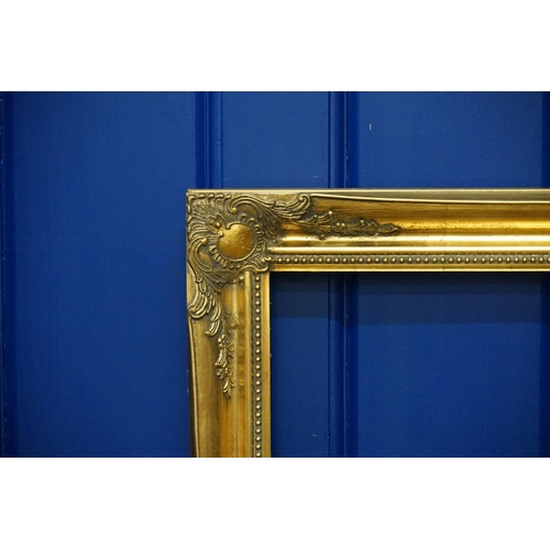 797 - A modern Gilt Framed Picture Frame to fit a picture size: 92cms x 123cms.