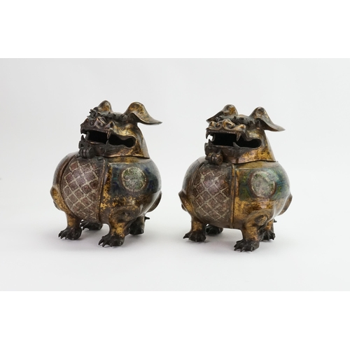 902 - A Pair of Japanese Cloisonne enamelled mythical Birds. 
Designed as Incense Burners in Squat Form & ... 