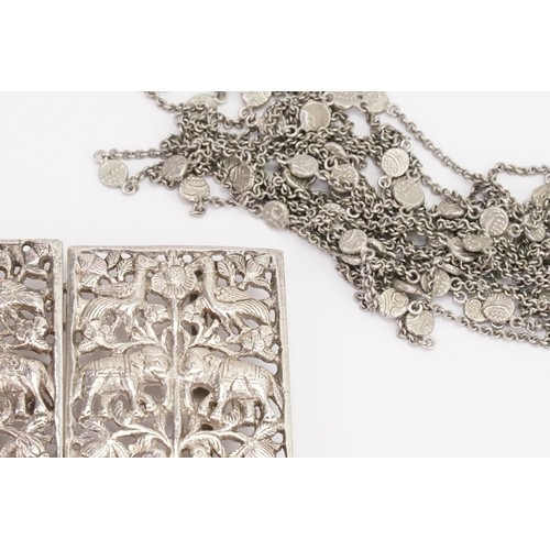 89 - An Indian silver elephant decorated buckle, along with a silver Indian strand necklace. Weight 107g.