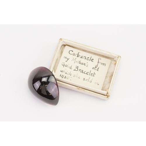 203D - A large pearl shaped single cabochon garnet, approximatley 2.7cm x 2.2cm. 1cm deep. Weight 10g.