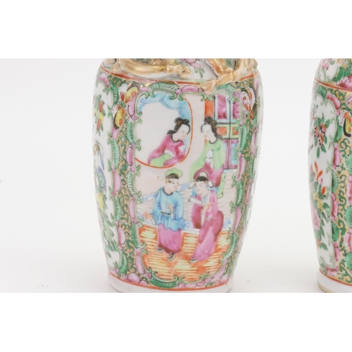 901A - A pair of mid-19th century Canton Famille rose porcelain vases. Decorated with dragon handles and st... 