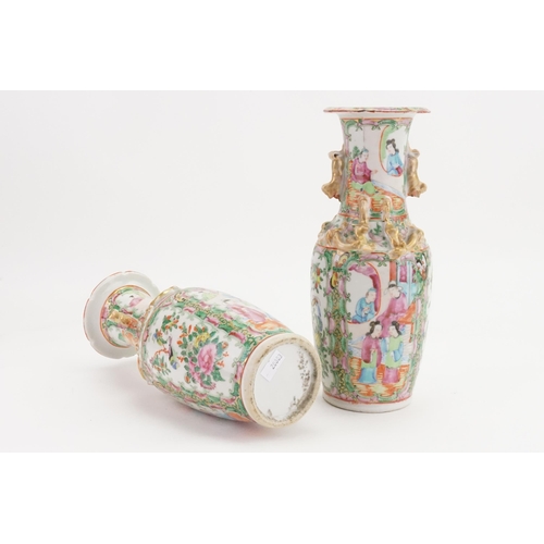 901A - A pair of mid-19th century Canton Famille rose porcelain vases. Decorated with dragon handles and st... 