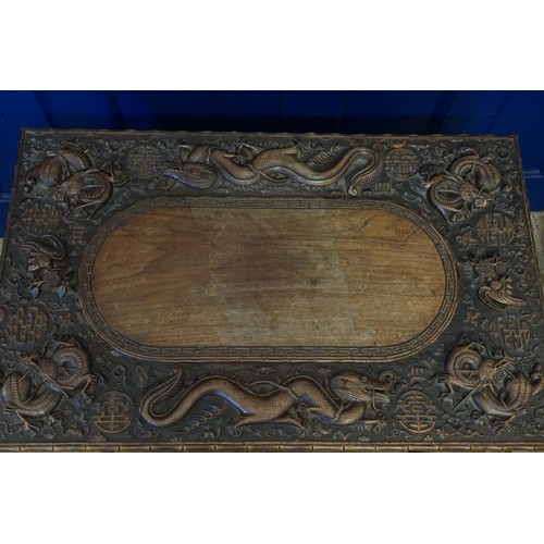 651 - A Carved Dragon & Sun designed Chinese Desk with Bamboo edging design & Camphor inlay. Measuring: 86... 