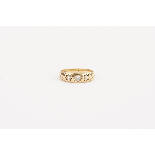 121 - A 15ct gold diamond gypsy ring, set with three diamonds (largest approx 0.15ct). Weight 4.2g. Size P... 