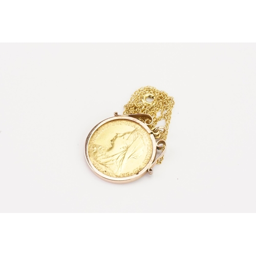 122 - A 1901 Queen Victoria old head sovereign, Melbourne mint mark, mounted in a 9ct gold mount. Hung on ... 