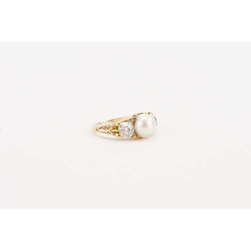 133 - A circa 1880 18ct pearl and diamond set ring. Set with a centre pearl measuring 8.2mm x 8.3mm. Set w... 