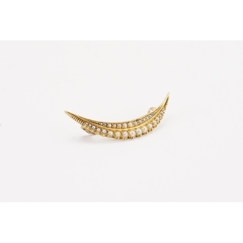 96 - A 15ct gold seed pearl moon brooch. Weight 4.5g.