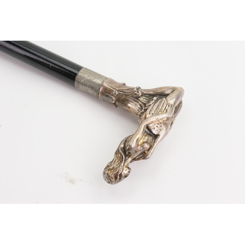 180 - A Italian possible Irvestito 925 hallmarked walking stick, topped with a silver nude lady and swan. ... 