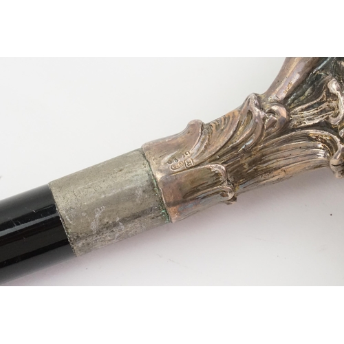 180 - A Italian possible Irvestito 925 hallmarked walking stick, topped with a silver nude lady and swan. ... 