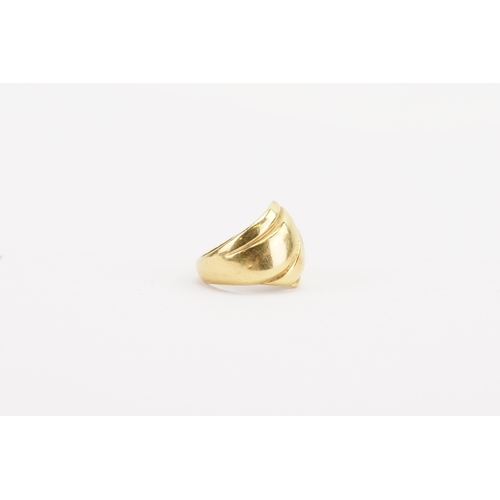 80 - A 18ct gold swirl design ring. Weight 7.2g. Size J.