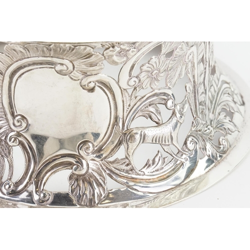 6 - An Irish Silver Dish Ring or Potato Ring in the Georgian Style decorated with Dogs & Rococo Flowers ... 