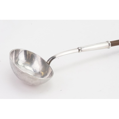 29 - A silver 18th Century Georgian 1731 London marked ladle by Joseph Clare I, with carved wooden handle... 