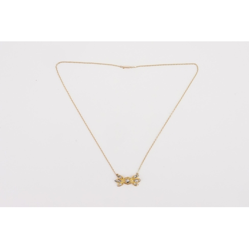 83 - A British colonial style high carat gold and rose cut diamond set necklace, designed as a bow format... 