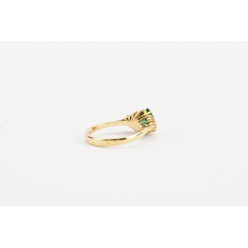 84 - A 18ct gold pear shaped emerald and diamond set ring by Garrard, set with 1.1ct pear shaped emerald,... 