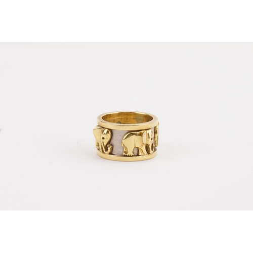 156 - A high carat gold elephant designed thick band. Weight 18.5g. Size R.