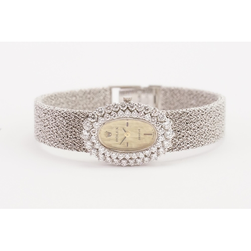 175 - A stunning vintage circa 1960's ladies Rolex, in 18ct white gold, set with a double row of 52 factor... 