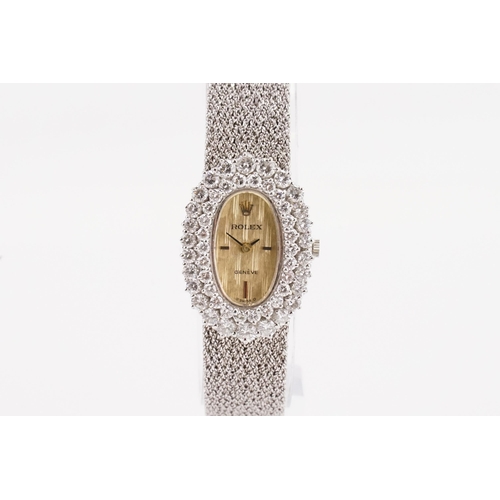 175 - A stunning vintage circa 1960's ladies Rolex, in 18ct white gold, set with a double row of 52 factor... 