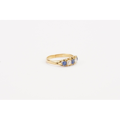 69 - A 18ct gold diamond and sapphire set ring, set with old cut diamonds and sapphires. Largest diamond ... 