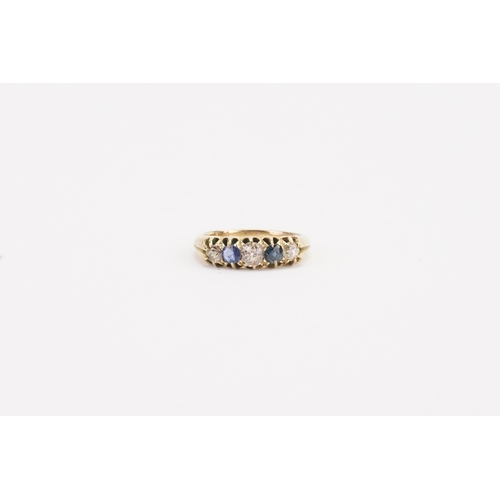 71 - A higher than 9ct gold diamond and sapphire set ring, set with old cut diamonds approximately 0.25ct... 