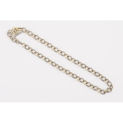 56 - A 18ct gold and 925 marked David Yurman necklace. In the rope and hoop design. Length 42cm. Weight 3... 