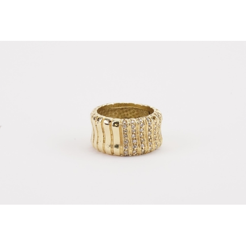 102 - A 14ct gold chunky cuff ring, set with chip diamonds. Weight 14.2g. Size O. (missing a few diamonds)