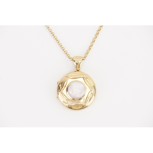 112 - A 9ct Gold 1950s design Mother of Pearl set Locket hung on a Hoop Link 9ct Gold Chain with Original ... 